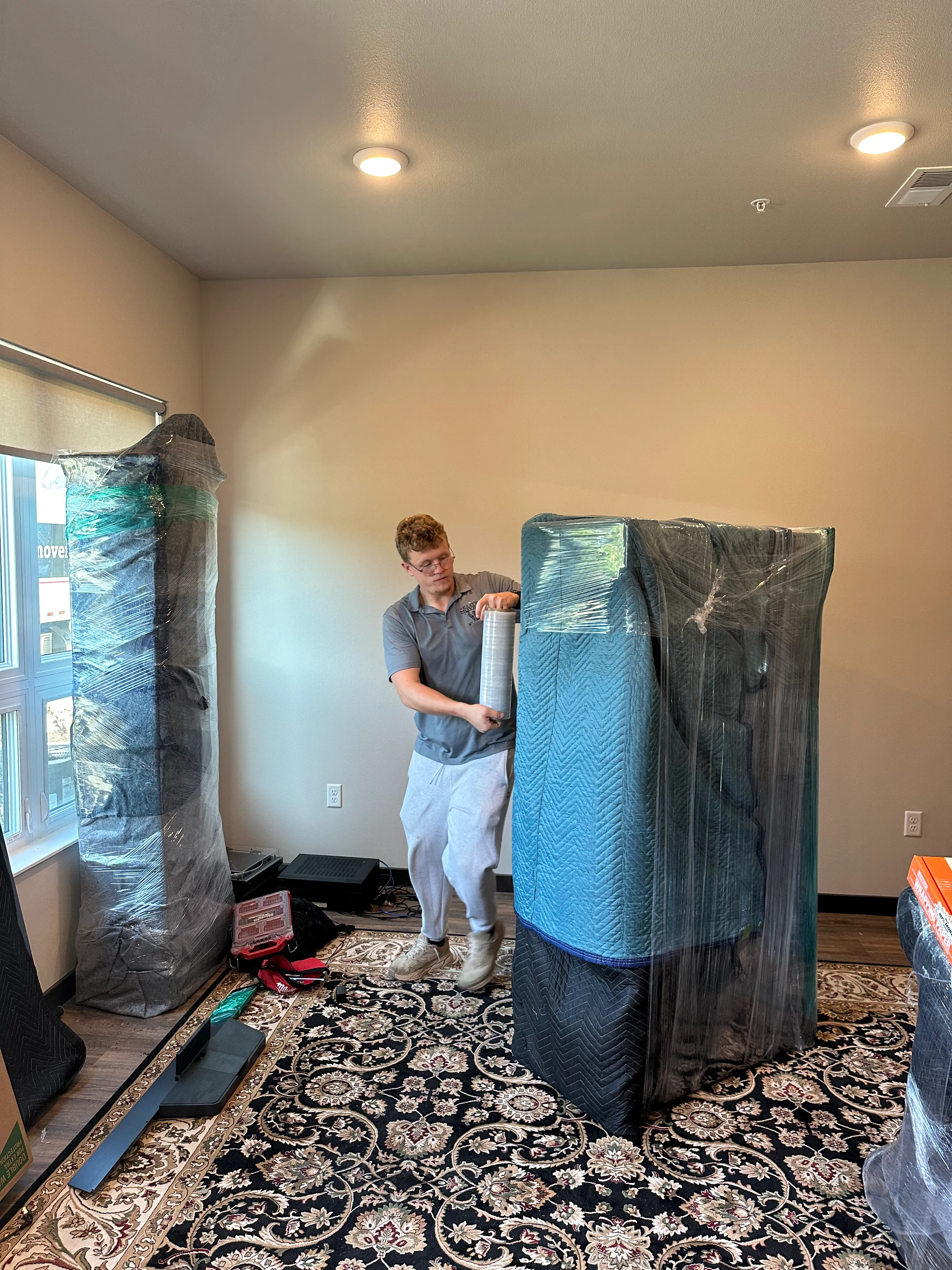 Furniture wrapped and protected with moving pads